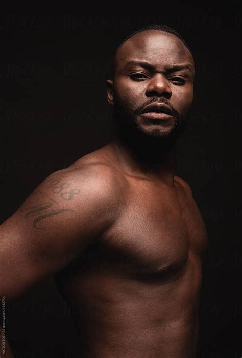 Black Man With Naked Torso By Stocksy Contributor VICTOR TORRES Stocksy
