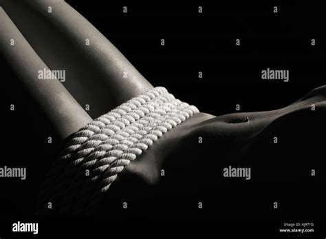Beautiful Naked Woman Body And Ropes Stock Photo Alamy