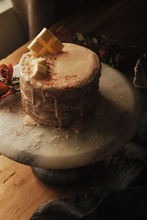 Naked Cake Topped With Cream Cheese Frosting White Chocolate And Pink Salt Styling By Kay