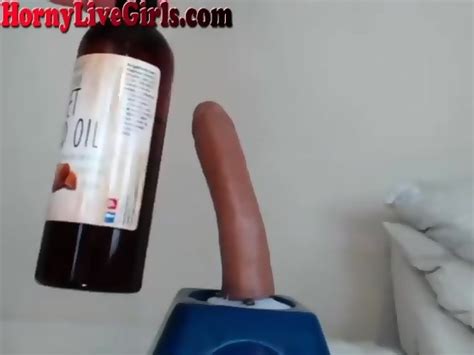 Oiled Up Milf Rides Her Dildo On Webcam