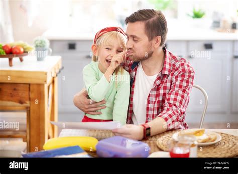 Cheerful Blonde Daughter Having Much Fun With Daddy Stock Photo Alamy