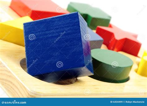 Square Peg In A Round Hole Stock Image Image Of Wooden 6434499