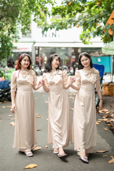 Mẫu áo dài bưng quả màu nude kết nơ BNU90 Áo Dài NiNi