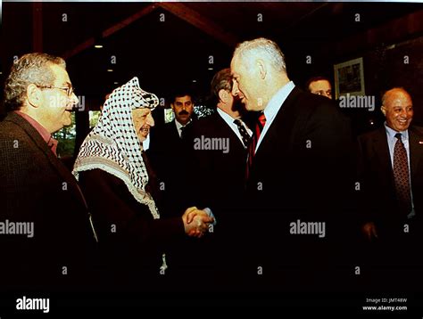 Israeli Prime Minister Binyamin Netanyahu And Palestinian Authority Chairman Yasser Arafat At