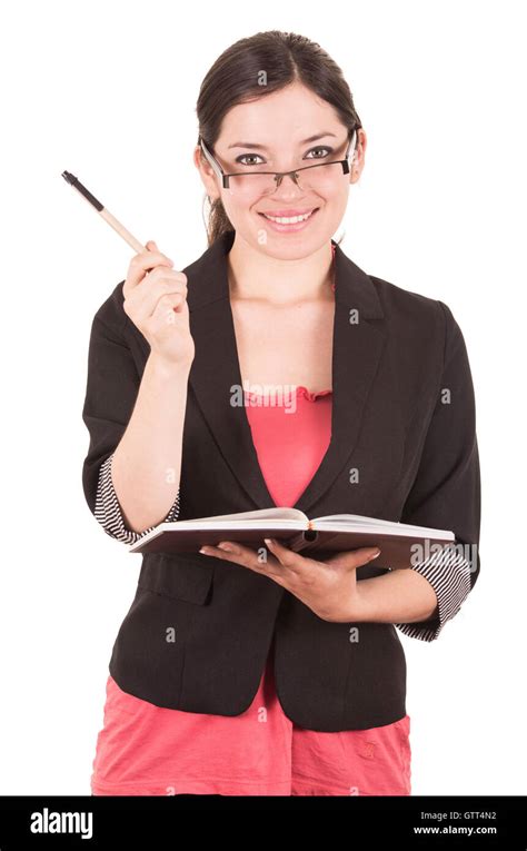 Portrait Of Pretty Female Teacher Wearing Glasses And Holding Book