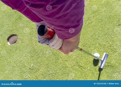 Lovely Blonde Female Golfter Enjoying A Round Of Golf On A Public Golf Course Stock Photo