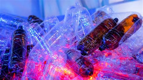 plastic bottle installation  blue  red illumination ecology