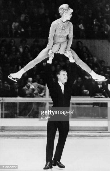 Russian ice skater Oleg Protopopov lifts his partner Ludmilla... News ...