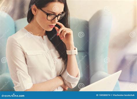 Serious Brunette Thinking About Her Project Stock Photo Image Of Face Female