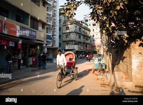 Dhaka Bangladesh February Man Riding An Empty Rickshaw On The