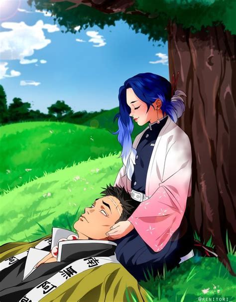 A Man Laying On The Ground Next To A Woman Under A Tree With Blue Hair