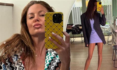Nude Artist Dina Broadhurst Puts On A Leggy Display In Figure Hugging Mini Dress And Shows Off