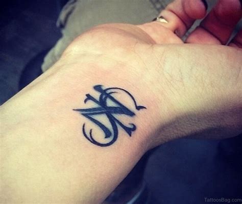 48 Unique Initial Tattoos For Wrist Tattoo Designs TattoosBag