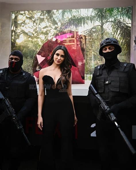 Sexy Hot Nikita Dutta In A Black Strapless Bust Plunge Neck Dress Photos Kollywood