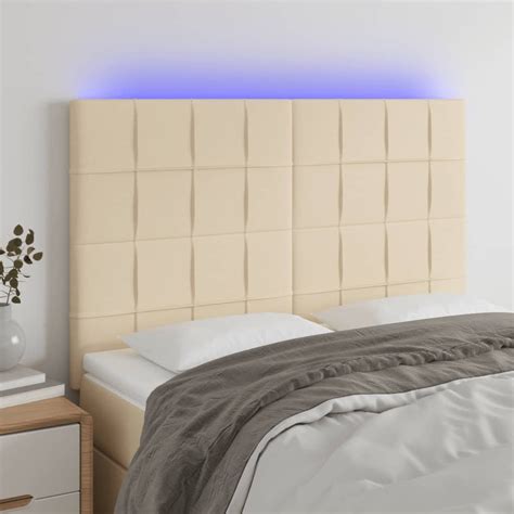 vidaXL Zagłówek do łóżka z LED kremowy 144x5x118 128 cm tkanina