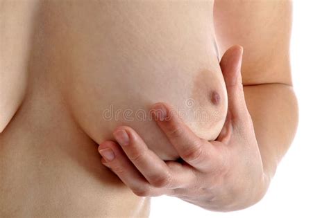 Close Up Of A Hand Holding A Naked And Oiled Female Breast In Photo Studio Stock Image Image