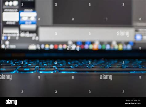 An Open Laptop Keyboard Screen With Working Application Windows