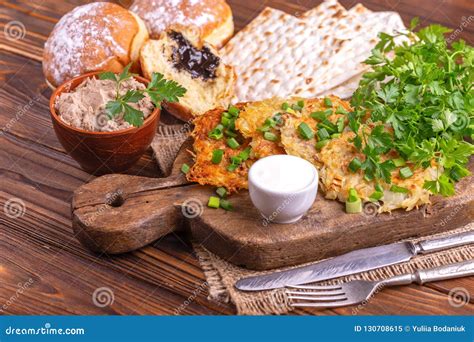 Tasty Hanukkah Celebration Food On Vintage Cutting Board Stock Image