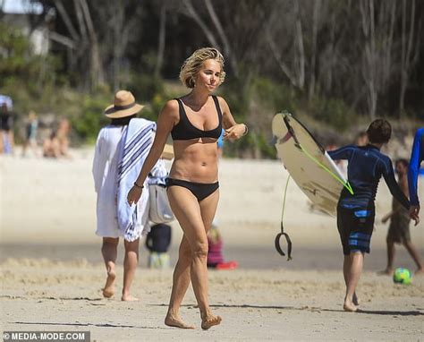 Pip Edwards Showcases Her Toned Figure In A Tiny Black Bikini As She