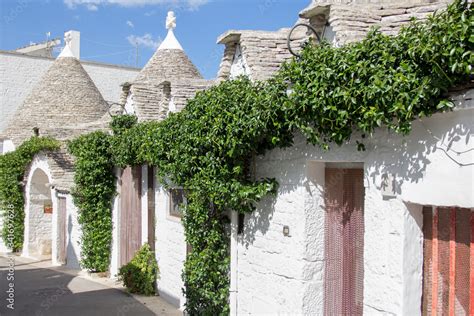 The Trulli Of Alberobello Is A Traditional Apulian Dry Stone Hut With A