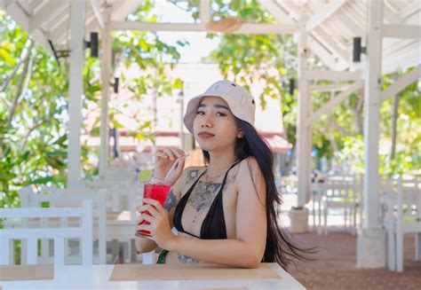 Premium Photo Youn Beautiful And Sexy Woman In Bikini With Fresh Juice In Restaurant Smiling