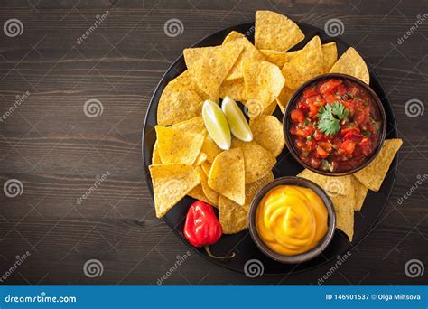 Mexican Nachos Tortilla Chips With Salsa And Cheese Dip Stock Image