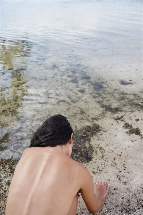 Nude Woman Exploring Ocean Lagoon By Stocksy Contributor Trinette Reed Stocksy