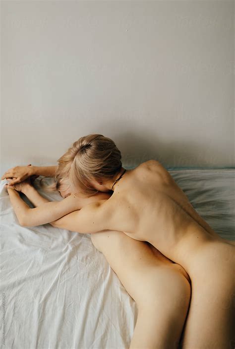 Lesbian Couple On The Bed By Stocksy Contributor Alexey Kuzma Stocksy
