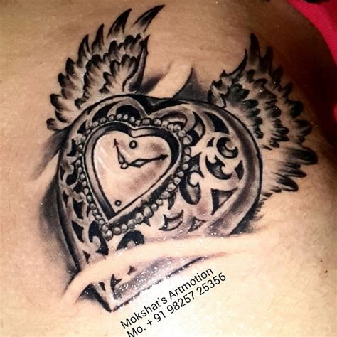 Heart watch Angel wings tattoo 3d tattoo done by Mokshat's Artmotion ...