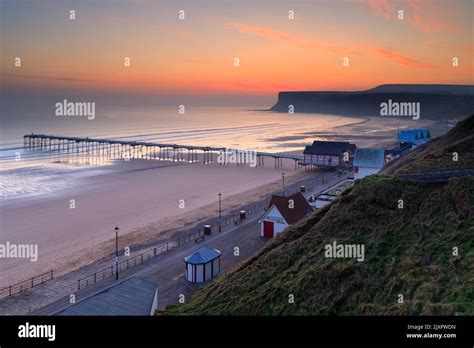 Saltburn Pier And Beach Captured At Sunrise From A High Vantage Point