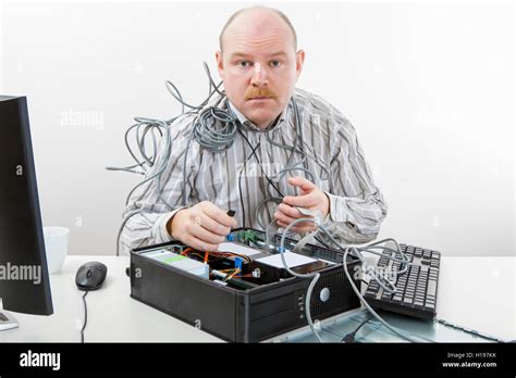 Confused Looking Computer Technician Hi Res Stock Photography And