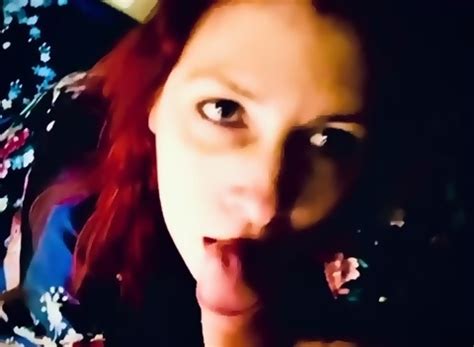 Redhead Milf On Her Knees Sucking Cock And Takes The Cum In Her Mouth And Continues To Suck His