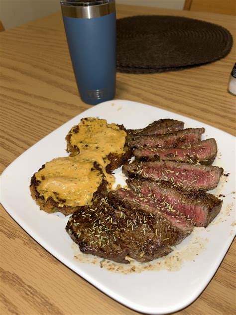 Skillet seared top sirloin with crab cakes and remoulade | Scrolller