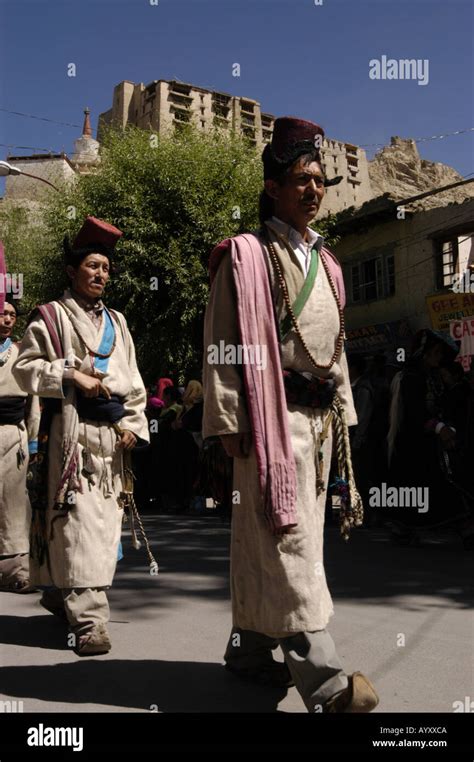 Traditional Dress Ladakhi Men With Leh Palace In Background During