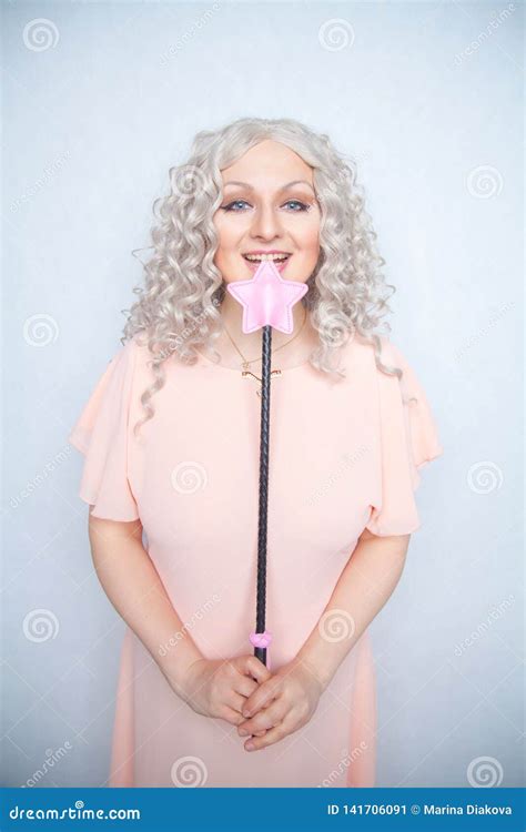 Kinky Pretty Woman With Pink Star Riding Crop Cute Blonde Woman Holds Bdsm Whip On White Solid
