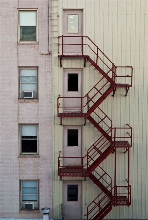 Red Staircase fire escape | Stairs design, Fire escape, Staircase