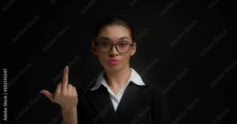 Confident Serious Business Woman In Glasses And Office Clothes Shows The Middle Finger Fuck