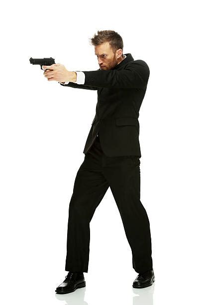 Man Pointing Gun Suit Full Body Pictures, Images and Stock Photos - iStock