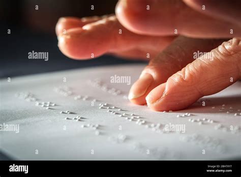 Close Up Photo Of A Woman Hands Reading Braille Text Stock Photo Alamy