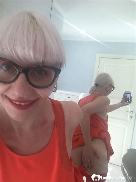 Mature Blonde Strips Naked Shows Off Her Big Tits While Taking Nudes Nakedpics