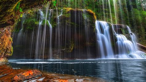 Beautiful Scenery Waterfalls From Rocks Pouring On Lake In Green Trees Background Hd Nature