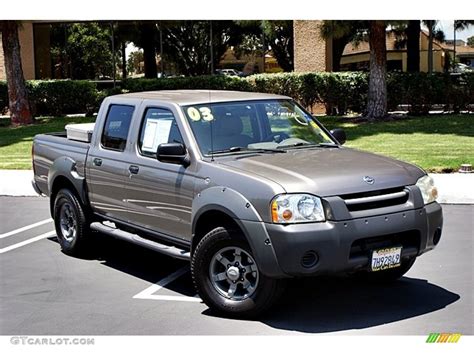 Sand Dune Metallic Nissan Frontier Xe V Crew Cab Exterior Photo