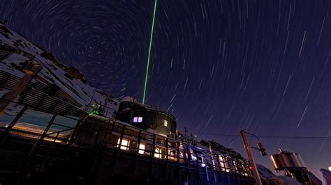 From A Snowy Alpine Lair Lasers Pierce The Night Abc News