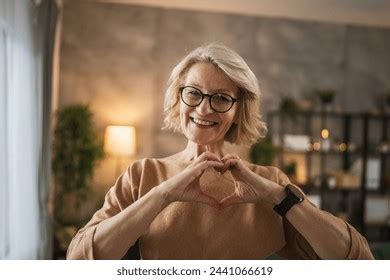 Smiling Mature Woman Looking Camera Pose Stock Photo 2415509673 Shutterstock