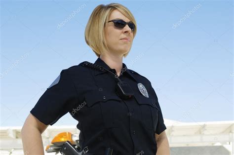 Police Officer Wearing Sunglasses — Stock Photo © londondeposit #21800453