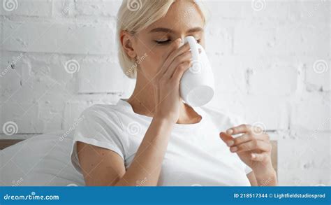 Blonde Woman In White T Shirt Stock Photo Image Of Woman White
