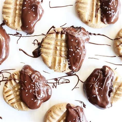 Chocolate Dipped Peanut Butter Cookies Recipe | The Feedfeed