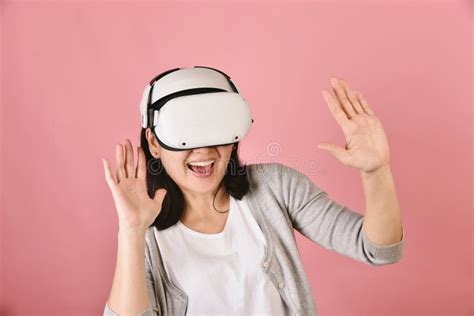 Asian Woman Using Vr Glasses Watching Movie And Playing Video Games