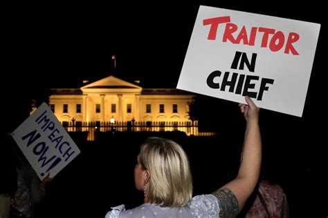 Donald Trump greeted by protesters outside White House after Putin summit