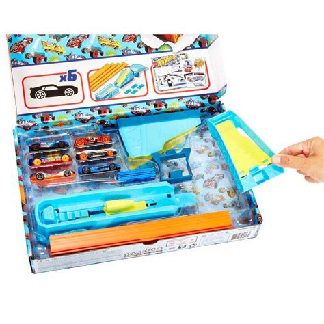 Hot wheels Pack Celebración 6 Vehículos Sorpresa Con Pistas De Coches De Juguete Y Set Para